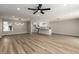 Spacious living room featuring hardwood floors and a ceiling fan at 3901 Oakhill Ave, Las Vegas, NV 89121