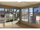 Sunroom with multiple windows offering backyard views at 9904 Arbuckle Dr, Las Vegas, NV 89134