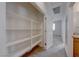 Spacious hall closet with ample shelving for storage at 1153 Pine Cove Ct, Henderson, NV 89011