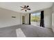 Spacious bedroom with sliding glass doors and a view of the backyard at 2 Vicolo Verdi, Henderson, NV 89011