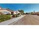 House exterior showcasing well-maintained landscaping and street view at 2904 Calmada Ave, Henderson, NV 89074