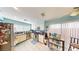 Well-equipped kitchen with light cabinets and tiled backsplash at 2904 Calmada Ave, Henderson, NV 89074