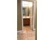 Bathroom with wood vanity and tile floor at 3105 Scalise Ct, Las Vegas, NV 89141