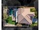 Two-story house with a tile roof and a backyard pool at 3974 Tropical Vine St, Las Vegas, NV 89147