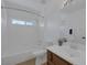 Clean bathroom with tub/shower combo, vanity, and updated fixtures at 3974 Tropical Vine St, Las Vegas, NV 89147