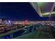 Private balcony overlooking the Las Vegas Strip at night at 4471 Dean Martin Dr # 3000, Las Vegas, NV 89103