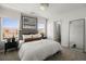 Spacious bedroom with large windows and en-suite bathroom at 4939 Aitana St # 2, Las Vegas, NV 89115