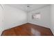 Bright bedroom featuring hardwood floors and ceiling fan at 502 Edgefield Ridge Pl, Henderson, NV 89012