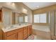 Double vanity bathroom with soaking tub and separate shower at 6644 Fort William St, North Las Vegas, NV 89084