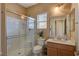 Clean bathroom with shower, toilet and vanity at 6644 Fort William St, North Las Vegas, NV 89084