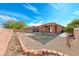 Spacious backyard with gravel and partial grass at 7542 Fort Mcdermitt Ave, Las Vegas, NV 89179