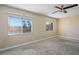 Bright bedroom with two windows and ceiling fan at 2033 Sedona Creek Cir, Las Vegas, NV 89128