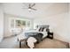 Main bedroom features high ceilings, bay window, and plush carpet at 3105 Birdwood Dr, Las Vegas, NV 89134