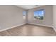 Bright bedroom with wood flooring and window at 3409 Iron Hagen Ct, Las Vegas, NV 89141