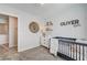 Bedroom with crib, dresser, and animal-themed decor at 344 Banished Ave # 3, North Las Vegas, NV 89031