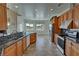 Well-equipped kitchen featuring granite countertops and breakfast nook at 3580 Prairie Ave, Pahrump, NV 89048