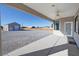 Covered patio with view of backyard and detached garage at 3580 Prairie Ave, Pahrump, NV 89048