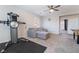 Home gym and game room featuring a comfortable couch and foosball table at 4008 W Le Baron Ave, Las Vegas, NV 89141