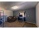 Home office with a round chair, desk, and shelving unit at 436 Emden St, Henderson, NV 89015