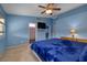 Spacious bedroom with a large bed and en-suite bathroom at 4365 El Como Way, Las Vegas, NV 89121