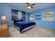 Serene bedroom with a calming moonlit ocean wall mural at 4365 El Como Way, Las Vegas, NV 89121