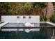 Relaxing pool with a water feature and a tranquil atmosphere at 438 Serenity Point Dr, Henderson, NV 89012