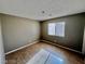 Simple bedroom with tile flooring and neutral walls at 530 Brownlee Dr, Henderson, NV 89015