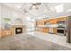 Kitchen with wood cabinets, stainless steel appliances and fireplace at 923 Highland Trails Ave, Henderson, NV 89015