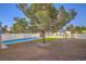 Landscaped backyard with pool and covered patio at 1236 S 8Th St, Las Vegas, NV 89104