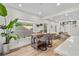 Bright dining area with wooden table and chairs, near the kitchen at 2628 Starfish Ct, Las Vegas, NV 89128