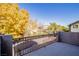 Private balcony with a view of a tree and backyard at 3812 Lower Saxon Ave, North Las Vegas, NV 89085