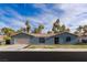 Ranch style home with attached two-car garage and desert landscaping at 3850 Pacific St, Las Vegas, NV 89121