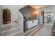 Staircase with decorative wall and view into kitchen at 409 Dairy Creek Ave, Las Vegas, NV 89183