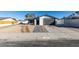 Newly renovated home with modern exterior and landscaped front yard at 5610 Surrey St, Las Vegas, NV 89119