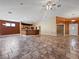 Open concept living room and kitchen with tile floors at 570 Long Iron Ln, Mesquite, NV 89027