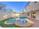 Stunning pool and spa with backyard view at 686 Ribbon Grass Ave, Las Vegas, NV 89183