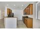 Kitchen with stainless steel appliances and wood cabinets at 765 Crest Valley Pl, Henderson, NV 89011