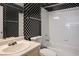 Bathroom with a shower, toilet and vanity at 7972 W Nevso Dr, Las Vegas, NV 89147