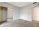 Spacious bedroom featuring mirrored closet doors at 8501 W University Ave # 2012, Las Vegas, NV 89147