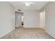 Spacious bedroom with ceiling fan and carpet at 8501 W University Ave # 2012, Las Vegas, NV 89147