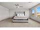 Spacious bedroom with a large bed and plenty of natural light at 9872 Russian Hill St, Las Vegas, NV 89141