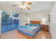 Spacious bedroom with sliding glass doors to patio at 1626 Teardrop St, Las Vegas, NV 89142