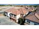 Aerial view of a two-story house with tile roof and attached garage at 3760 Lodina Ct, Las Vegas, NV 89141