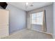 Simple bedroom with window and neutral walls at 3760 Lodina Ct, Las Vegas, NV 89141