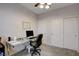 Bedroom with desk, double door closet, and window at 3760 Lodina Ct, Las Vegas, NV 89141