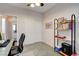 Bedroom with desk, double door closet, and window at 3760 Lodina Ct, Las Vegas, NV 89141