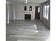 Living room with fireplace and grey flooring at 3979 Lilac Haze St, Las Vegas, NV 89147