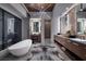 Spa-like bathroom with freestanding tub and double vanities at 1006 Mystic Rim Dr, Henderson, NV 89012