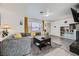 Living room with gray sectional sofa and built-in shelving at 2029 Valley Dr, Las Vegas, NV 89108