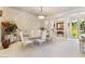 Bright dining room with elegant table and chairs, and decorative wall at 3754 Aldenham Dr, Las Vegas, NV 89141